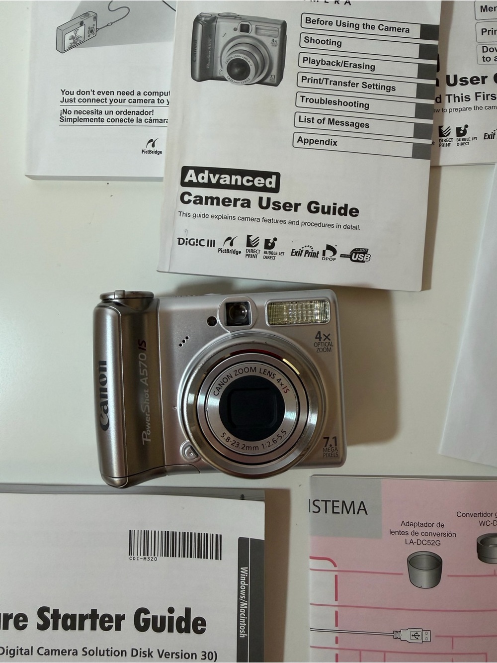 Canon PowerShot A570 IS 7.1MP Digital Camera Bundle w/ Box Manuals Cable Case